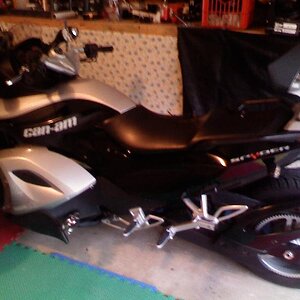 Garaged.  My wife cut down my work bench so Spydie would fit!