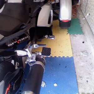 Passenger Foot Rest 2.  The stock peg was hard on my wif'e arch, so I made some plates for her feet.