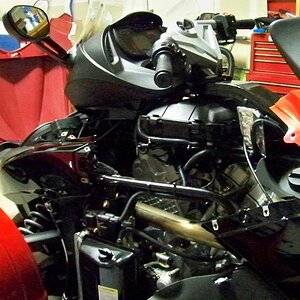 1st lesson in accessorizing ... DON'T accidently drop a bolt down into the engine because then you have to pull off all the panels and spend a REALLY 