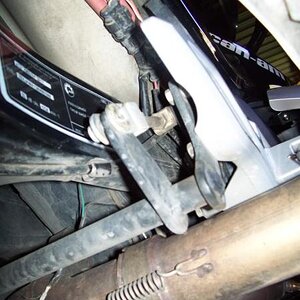 Foot brake. Right side showing linkage from below