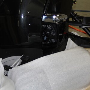 Front fenders are bolted to the base on the right side.