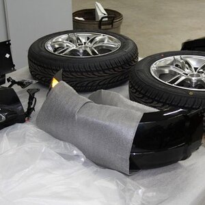 Fenders and wheels after removing from crate.