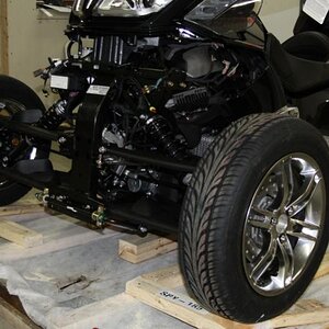 Front end after having been jacked up and wheels put on.