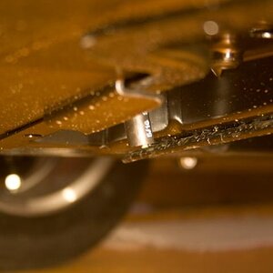 2010 RS SpyderNewEvapCan 5 - Notice the vent hose coming out at the bottom of the bike, just below the floorpan, letting the vapor out into the air, o