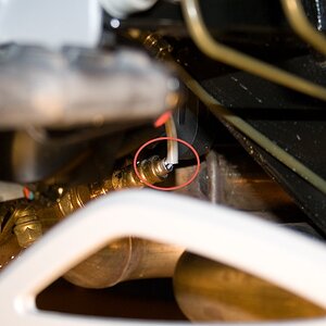 2010 RS O2SensorTooExposed 2 - Annotated oval shows the area where wires are not covered and exposed to elements. I was thinking of covering this up w