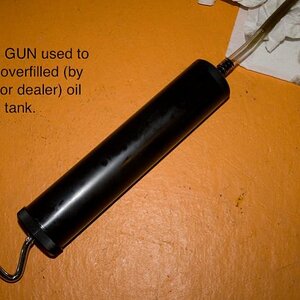 Spyder Dealertoomuchiol 6- After removing 12oz of oil (overfilled by factory or dealer) I am on the BRP recommended oil level mark, now