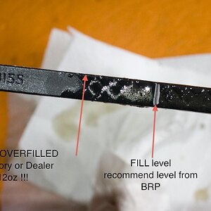 Spyder Dealertoomuchiol 3- After removing 12oz of oil (overfilled by factory or dealer) I am on the BRP recommended oil level mark, now