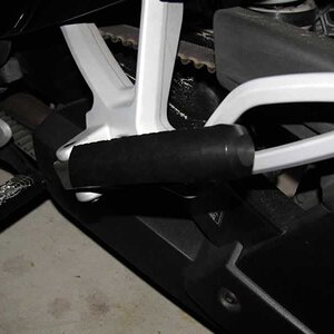 Foot peg in folded position