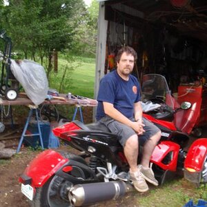 Me and my 08 SM5 getting ready to put on Kewl Metal Risers outside the shop