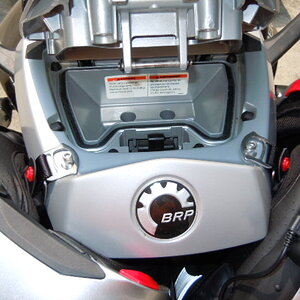 The helmets hang without holding them before closing backrest.