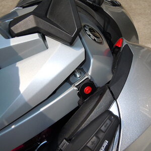 To remove the helmets, the backrest will pop up to the safety catch which allows enough room to remove the helmets over the stud.