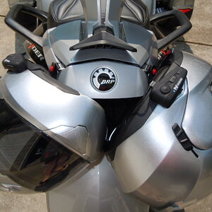 Backrest locked with two helmets. D-Ring extenders would allow the helmets to hang away from the bike but they are not required.