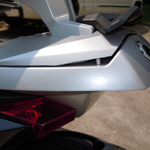 This shows the visible change of the screw and stud showing.