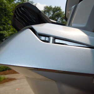 Close up of the backrest closed in the locked position. The outside edge is alrady tapered towards the rear.