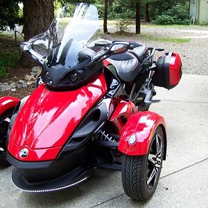 Having more fun that a barrel of Spyders personalizing the RS.  So far we've added Ultra-touring windshield; Givi Hardbags; Corbin seat (not heated); 