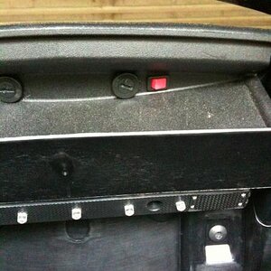 The Sopher Trunk light; three units middle unit is a light bar.
Notice the red power switch tucked under the edge.