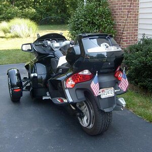My Spyder - Oblique Rear.  The white thingy on the seat is my Alaska Leather sheepskin cover.  Fits well.  The regular straps worked around the sides 