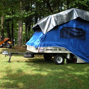 Survived 14 hours of non stop rain - dry as a bone!
(tarp is not pretty but it does the job !)