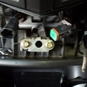 Inside the hood catch (if you zoom real close) you can see a seat for a spring. So...