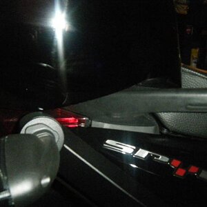 Where the Corbin seat lock is hidden beneath the Corbin topbox.  Yep, the box needs to be uninstalled to pop out the seat!