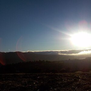 Sun setting over the fog that I rode out of