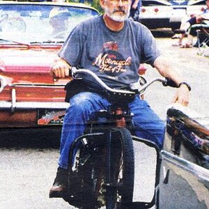 Riding my Simplex bobber at our annual Cruise-the-Gut in downtown Battle Creek, 2010.