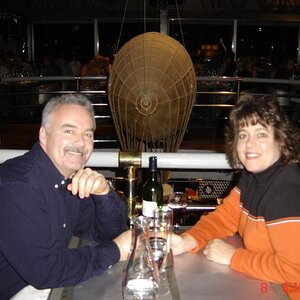 Vickie and I having dinner at the Eiffel Tower in '05.