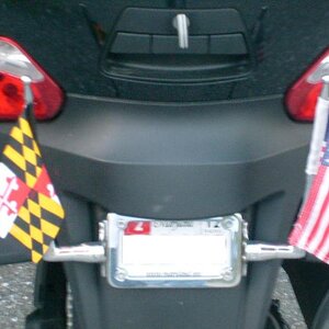 So okay ... if you get those Kuryakyn licence plate frame mounts, the "kit" comes with either a 4 1/2 x 8 1/2 USA or POW/MIA flag.  NOBODY Else makes 