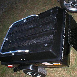 Our little trailer, see the Roll on bed liner on the three rails