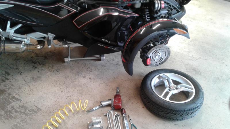2.  Remove wheels to make it easier to align the shocks back into the re-locater mounts