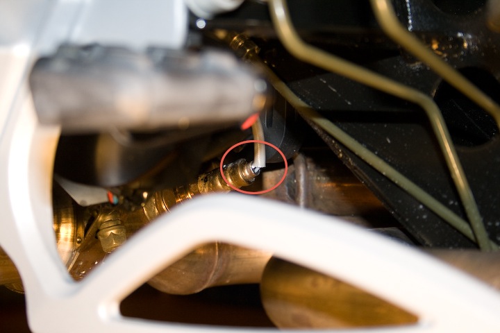 2010 RS O2SensorTooExposed 2 - Annotated oval shows the area where wires are not covered and exposed to elements. I was thinking of covering this up w