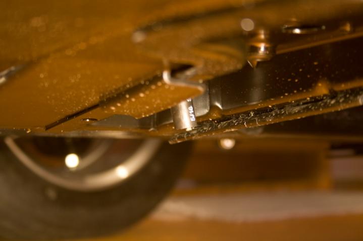 2010 RS SpyderNewEvapCan 5 - Notice the vent hose coming out at the bottom of the bike, just below the floorpan, letting the vapor out into the air, o