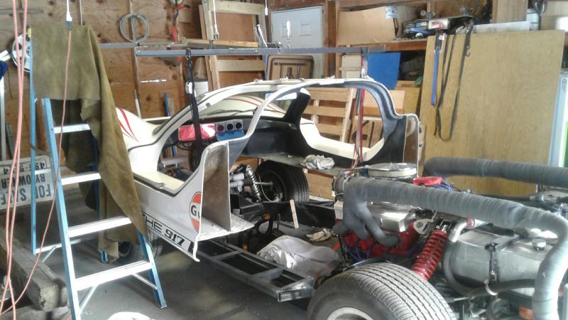 #7 Lifting the front half .... the orig exhaust pipes are now gone .... they prevented me from lowering the rear half down from 50 inches to 36 inches