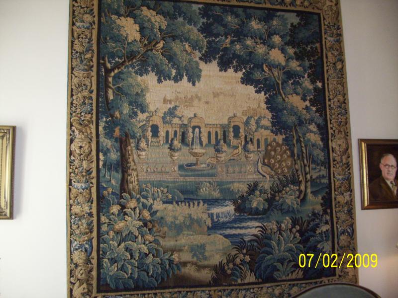 A tapestry depicting something about a small house where Josephine or such lived, she didn't like the palace (in France) so was quartered in a smaller