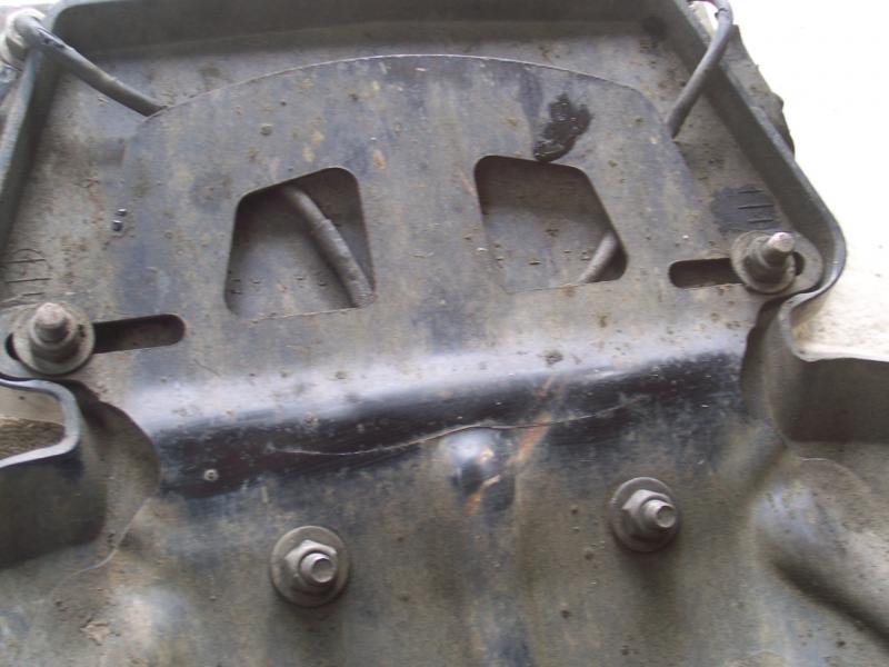 Across the lower portion behind the licence plate