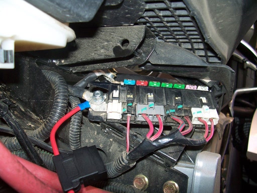 An in-line fuse for the trailer is connected to the live power. I would have used a switched power, but I wanted to have power for a light in the trai