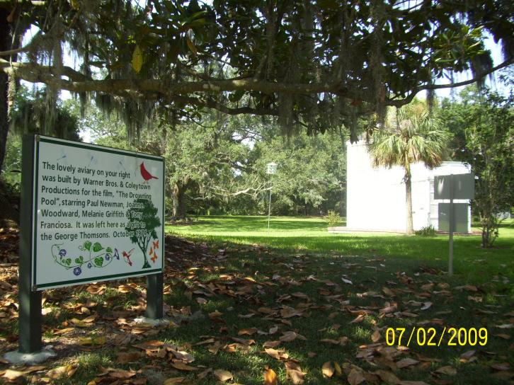 Aviary (white structure) explaination on the sign.