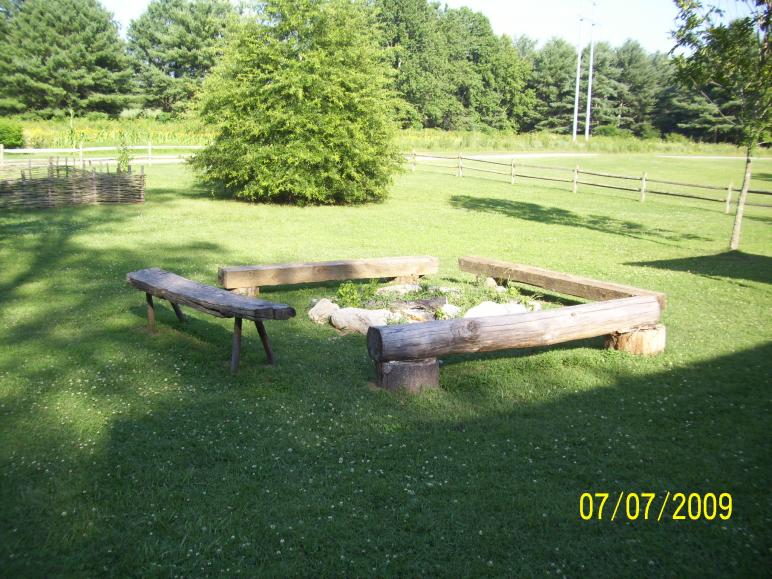 Benches around a fire pit; for sitting a spell and talking perhaps.