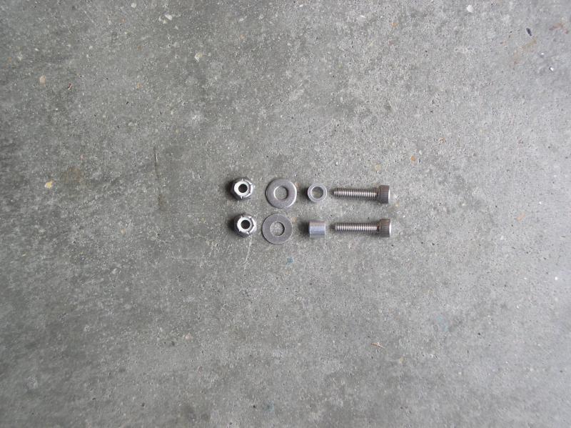 Bolt, spacer, washer, and nut ready for install.