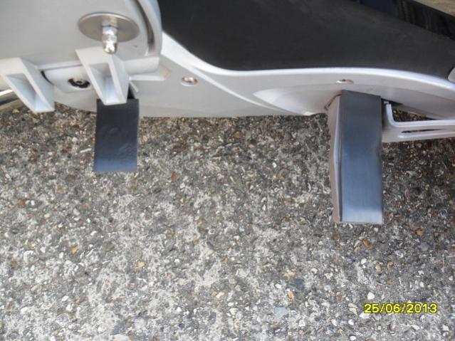 Both brackets L Shaped and OEM Footrest - showing the Foam rubber inserts laid on top ready for Seal Floorboards