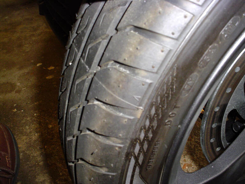 Both OEM front tires have pretty bad  ridges where the mold halves came together when building the tires.