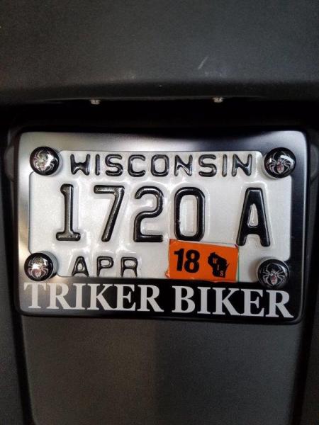 close up of license bracket, fasteners