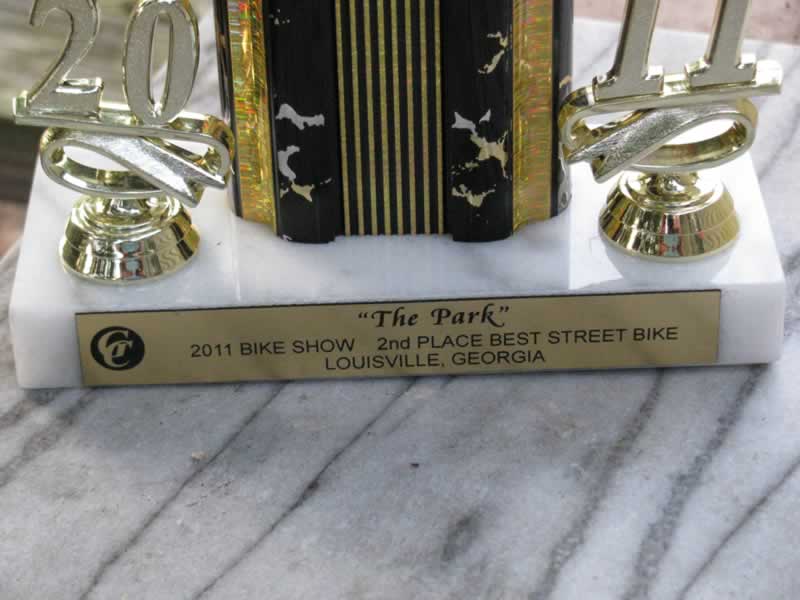 Close up of placard on front of trophy