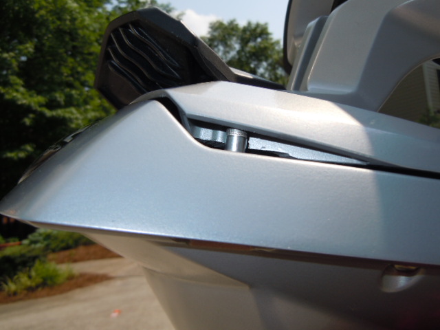 Close up of the backrest closed in the locked position. The outside edge is alrady tapered towards the rear.