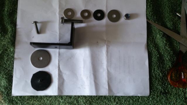 Close up view of L shaped bracket and some of the fittings S/S & Rubber washers