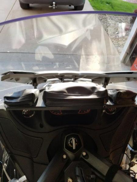 closer shot of tri-pouch mounted on dash