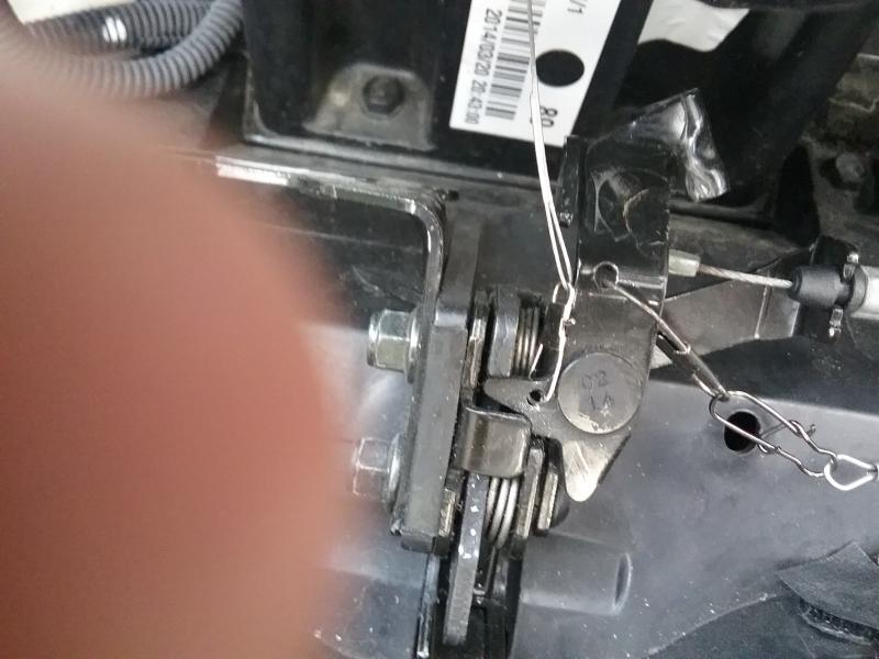 closeup frunk lock thumb