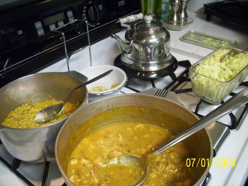 Crawfish etouffe, corn macque choux, potato salad