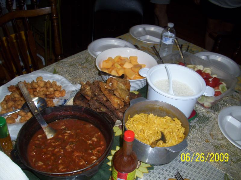 Crawfish etouffe, fried shrimp, fried fish, veggies...we won't say who sat in THAT chair.  Lake Arthur, LA.