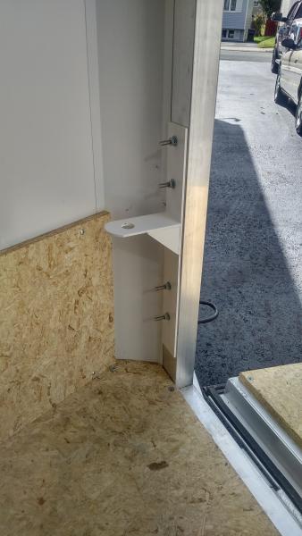 Custom bracket fabricated to hold 1 7/8 ball.